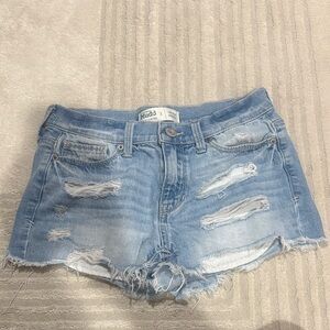 low rise, light washed, ripped shorts from Mudd size 3!
